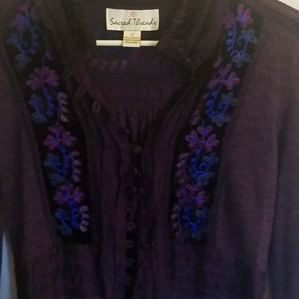 Unique top has a vintage style